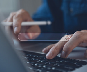 man on computer making a search in a search engine